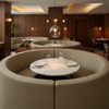 Fine Pebble Texture Muted Taupe Upholstered Banquette | Architectural Fabrics