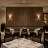 Biscay Bay Walnut Wood Grain | Hollywood Wallcoverings - Restaurant Dining commercial room setting