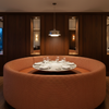 Woven Dot Pattern Terracotta Clay Upholstered Banquette | Architectural Fabrics