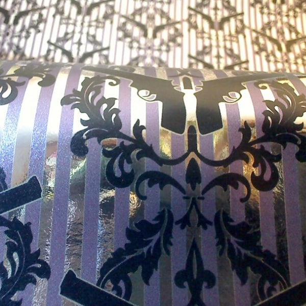 Thug Stripe - Purple Guns and Bullet Crest on Silver Shiny Mylar Gothic | Architectural Wallcoverings