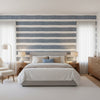 Mizu Stripe Slate Blue | Thibaut Wallcoverings - Bedroom Visualization (AI-generated, may not be to scale. Verify pattern scale with product specifications.)