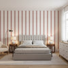 Reno Stripe Coral | Thibaut Wallcoverings - Bedroom Visualization (AI-generated, may not be to scale. Verify pattern scale with product specifications.)