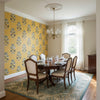 Lily Flower Harvest Gold | Thibaut Wallcoverings - Dining Room Visualization (AI-generated, may not be to scale. Verify pattern scale with product specifications.)