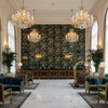 Nympheus Print Teal | Kravet - Hotel Lobby Visualization (AI-generated, may not be to scale. Verify pattern scale with product specifications.)