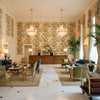 Chinese Lantern Lemon | Kravet - Hotel Lobby Visualization (AI-generated, may not be to scale. Verify pattern scale with product specifications.)