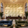Chinese Peony Gold | Kravet - Hotel Lobby Visualization (AI-generated, may not be to scale. Verify pattern scale with product specifications.)