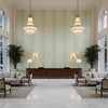Indian Zag Aqua | Kravet - Hotel Lobby Visualization (AI-generated, may not be to scale. Verify pattern scale with product specifications.)