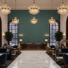 Oxford Velvet teal | Kravet - Hotel Lobby Visualization (AI-generated, may not be to scale. Verify pattern scale with product specifications.)