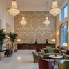 Sameera Spice/Berry | Kravet - Hotel Lobby Visualization (AI-generated, may not be to scale. Verify pattern scale with product specifications.)