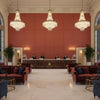 Skye Wool Maple | Kravet - Hotel Lobby Visualization (AI-generated, may not be to scale. Verify pattern scale with product specifications.)