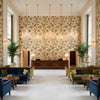 Leyland Print Berry/Forest | Kravet - Hotel Lobby Visualization (AI-generated, may not be to scale. Verify pattern scale with product specifications.)