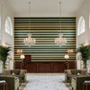 Entoto Stripe Juniper/Leaf | Kravet - Hotel Lobby Visualization (AI-generated, may not be to scale. Verify pattern scale with product specifications.)
