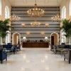 Entoto Stripe Ivory/Black | Kravet - Hotel Lobby Visualization (AI-generated, may not be to scale. Verify pattern scale with product specifications.)