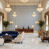 Laine Print Bluebell | Kravet - Hotel Lobby Visualization (AI-generated, may not be to scale. Verify pattern scale with product specifications.)