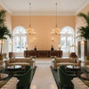 Kaya Ii Spice | Kravet - Hotel Lobby Visualization (AI-generated, may not be to scale. Verify pattern scale with product specifications.)