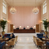Kaya Ii Berry | Kravet - Hotel Lobby Visualization (AI-generated, may not be to scale. Verify pattern scale with product specifications.)