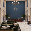 Gemma Velvet Blue | Kravet - Hotel Lobby Visualization (AI-generated, may not be to scale. Verify pattern scale with product specifications.)