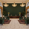 Gemma Velvet Emerald | Kravet - Hotel Lobby Visualization (AI-generated, may not be to scale. Verify pattern scale with product specifications.)