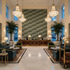 Arley Print Lagoon | Kravet - Hotel Lobby Visualization (AI-generated, may not be to scale. Verify pattern scale with product specifications.)