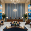 Picket Night Sky | Kravet - Hotel Lobby Visualization (AI-generated, may not be to scale. Verify pattern scale with product specifications.)
