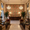 Granada Print Jewel | Kravet - Hotel Lobby Visualization (AI-generated, may not be to scale. Verify pattern scale with product specifications.)