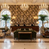 Upton Cotton Java/Moss | Kravet - Hotel Lobby Visualization (AI-generated, may not be to scale. Verify pattern scale with product specifications.)