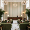 Nautique Emb Green/Blue | Kravet - Hotel Lobby Visualization (AI-generated, may not be to scale. Verify pattern scale with product specifications.)