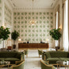 Calico Vine Greenery | Kravet - Hotel Lobby Visualization (AI-generated, may not be to scale. Verify pattern scale with product specifications.)