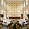 Calico Vine Marigold | Kravet - Hotel Lobby Visualization (AI-generated, may not be to scale. Verify pattern scale with product specifications.)