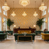 Clare Print Topaz | Kravet - Hotel Lobby Visualization (AI-generated, may not be to scale. Verify pattern scale with product specifications.)