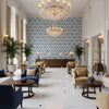Clare Print Marine | Kravet - Hotel Lobby Visualization (AI-generated, may not be to scale. Verify pattern scale with product specifications.)
