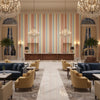 Fisher Stripe Meon/Aqua | Kravet - Hotel Lobby Visualization (AI-generated, may not be to scale. Verify pattern scale with product specifications.)