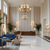 Fisher Stripe Navy/Petal | Kravet - Hotel Lobby Visualization (AI-generated, may not be to scale. Verify pattern scale with product specifications.)