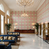 Davies Plaid Petal/Kiwi | Kravet - Hotel Lobby Visualization (AI-generated, may not be to scale. Verify pattern scale with product specifications.)