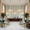 Davies Stripe Aqua/Leaf | Kravet - Hotel Lobby Visualization (AI-generated, may not be to scale. Verify pattern scale with product specifications.)