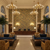 Strapwork Print Ivy/Blue | Kravet - Hotel Lobby Visualization (AI-generated, may not be to scale. Verify pattern scale with product specifications.)