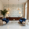 Calathea Print Aqua | Kravet - Hotel Lobby Visualization (AI-generated, may not be to scale. Verify pattern scale with product specifications.)