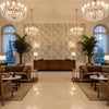 Eden Emb Aqua/Gold | Kravet - Hotel Lobby Visualization (AI-generated, may not be to scale. Verify pattern scale with product specifications.)