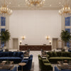 Ultrasuede Green light pink | Kravet - Hotel Lobby Visualization (AI-generated, may not be to scale. Verify pattern scale with product specifications.)