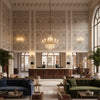 Ultrasuede Green taupe | Kravet - Hotel Lobby Visualization (AI-generated, may not be to scale. Verify pattern scale with product specifications.)