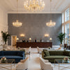 Ultrasuede Green Pewter | Kravet - Hotel Lobby Visualization (AI-generated, may not be to scale. Verify pattern scale with product specifications.)