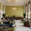 Ultrasuede Green chartreuse | Kravet - Hotel Lobby Visualization (AI-generated, may not be to scale. Verify pattern scale with product specifications.)