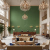 Ultrasuede Green olive green | Kravet - Hotel Lobby Visualization (AI-generated, may not be to scale. Verify pattern scale with product specifications.)