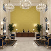 Ultrasuede Green beige | Kravet - Hotel Lobby Visualization (AI-generated, may not be to scale. Verify pattern scale with product specifications.)