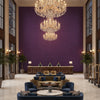 Ultrasuede Green Plum | Kravet - Hotel Lobby Visualization (AI-generated, may not be to scale. Verify pattern scale with product specifications.)