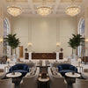 Suede Texture beige | Kravet - Hotel Lobby Visualization (AI-generated, may not be to scale. Verify pattern scale with product specifications.)