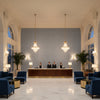 8016108.15.0 | Kravet - Hotel Lobby Visualization (AI-generated, may not be to scale. Verify pattern scale with product specifications.)