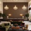 8022122.1616.0 | Kravet - Hotel Lobby Visualization (AI-generated, may not be to scale. Verify pattern scale with product specifications.)