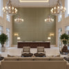 8023154.316.0 | Kravet - Hotel Lobby Visualization (AI-generated, may not be to scale. Verify pattern scale with product specifications.)