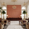 Pavilion Trellis Orange | Kravet - Hotel Lobby Visualization (AI-generated, may not be to scale. Verify pattern scale with product specifications.)